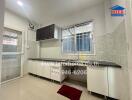 Modern kitchen with white cabinetry