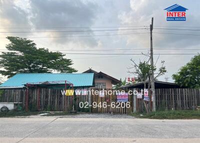 House exterior with a fence