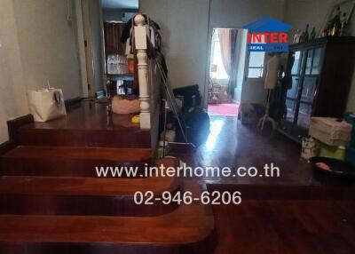 Staircase and living area in a residential home