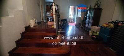 Staircase and living area in a residential home