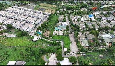 Aerial view of residential area showcasing various buildings and greenery