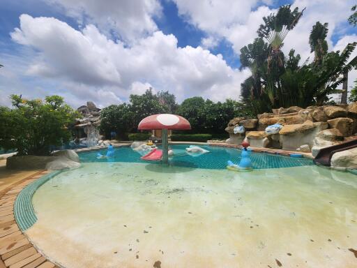 Swimming pool area with decorative features