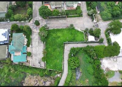 Aerial view of a residential neighborhood with houses and greenery