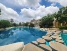 Outdoor swimming pool with surrounding greenery