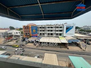 Street view of commercial and residential buildings