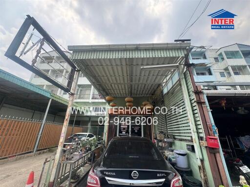 Carport and exterior view of a residential building