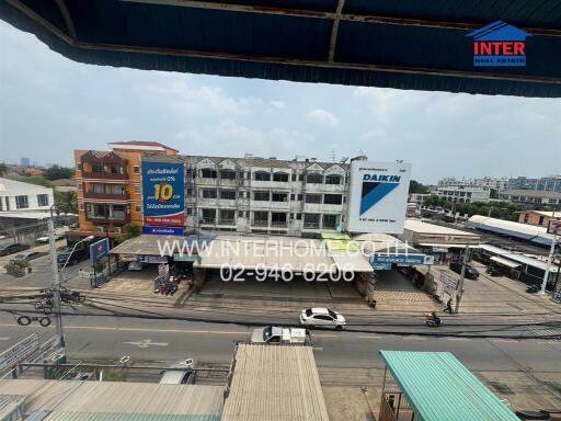 View of building and street from balcony