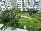 View of residential building with shared garden area