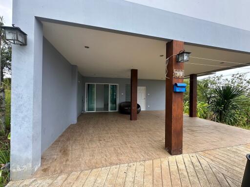 Covered outdoor area with sliding glass doors