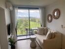 Modern living room with a scenic balcony view