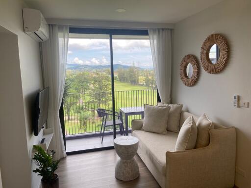 Modern living room with a scenic balcony view