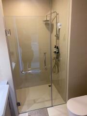 modern bathroom shower with glass enclosure