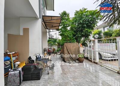 Outdoor space with covered area and storage