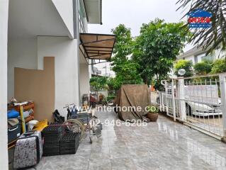 Outdoor space with covered area and storage