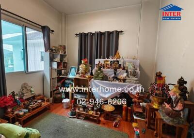 Living room with decorative items and a window