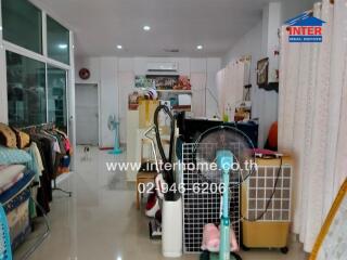 Main living area with household items and furnishings