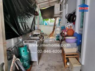 Outdoor cooking and utility area