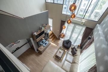 Modern double-height living room with contemporary decor