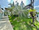 Exterior view of the property with lush greenery