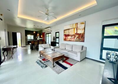 Spacious open-plan living area with modern décor