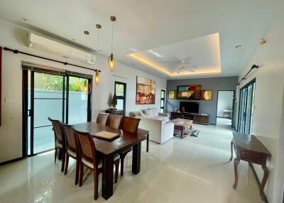spacious living and dining area with modern decor
