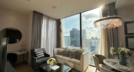 Modern living room with large windows and a city view