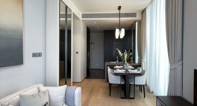 Modern dining area with a view of the living room