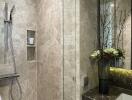 Modern bathroom with marble walls and a built-in shower