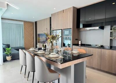 Modern kitchen with dining area and stylish decor