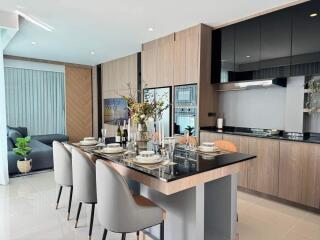 Modern kitchen with dining area and stylish decor