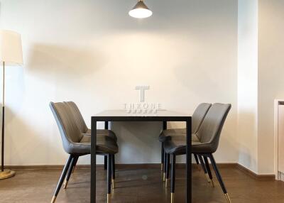 Modern dining area with table and chairs