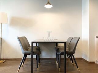 Modern dining area with table and chairs