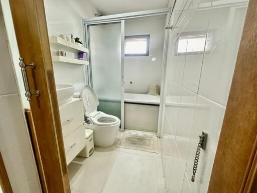 Modern bathroom with transparent sliding door