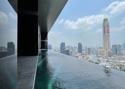 Infinity pool with a city skyline view