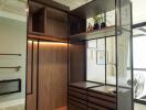 modern bedroom closet with shelving and drawers