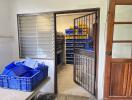 Storage room with shelves and plastic bins