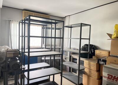 Storage room with metal shelves and boxes