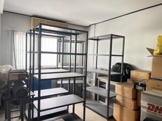 Storage room with metal shelves and boxes