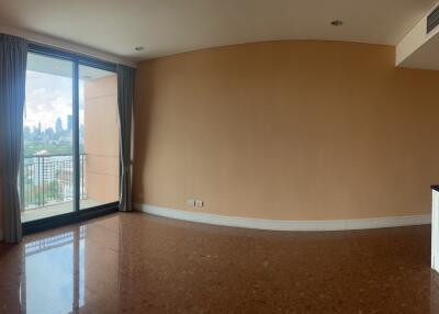 Empty living room with a balcony view