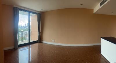 Empty living room with a balcony view