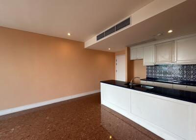 Modern kitchen with open layout and decorative backsplash