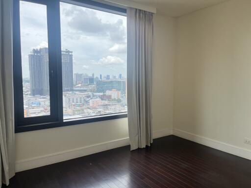 Empty bedroom with city view