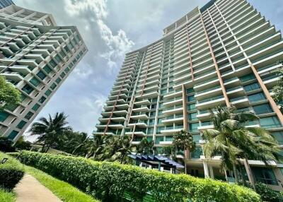 High-rise residential buildings with balconies in a tropical environment