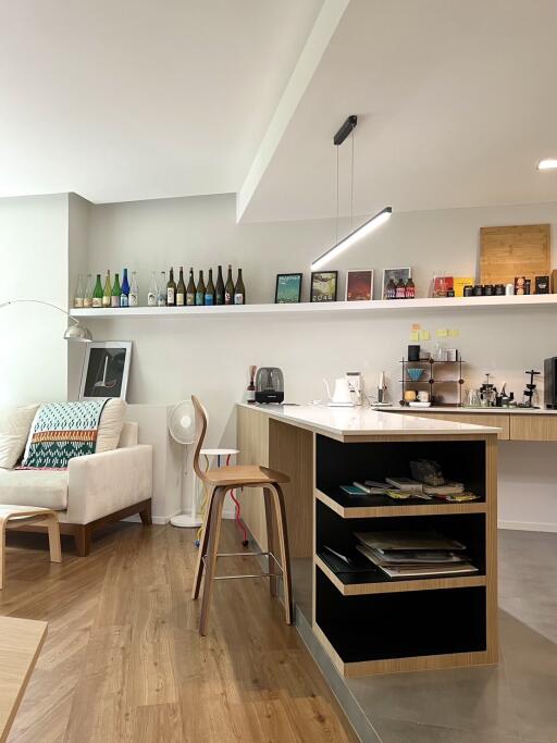 Modern kitchen with breakfast bar and cozy seating area