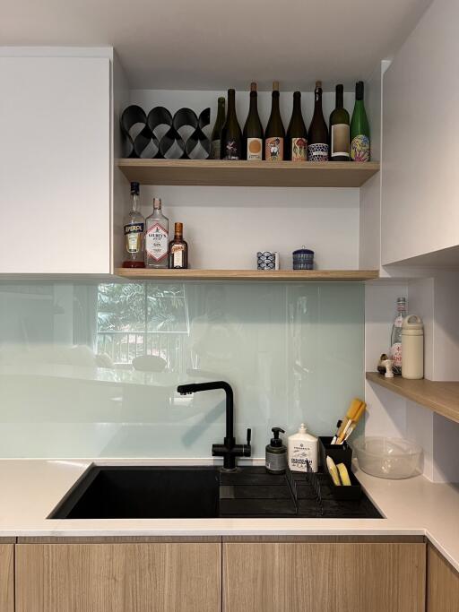 modern kitchen with black sink and countertop