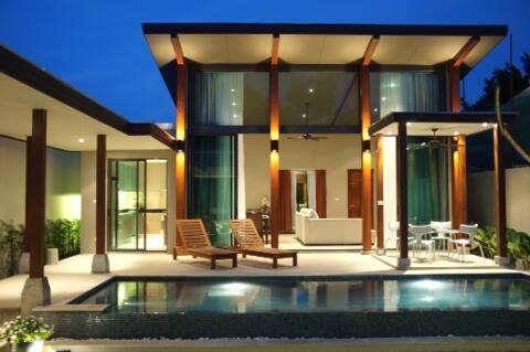 Modern house with outdoor pool and lounge area
