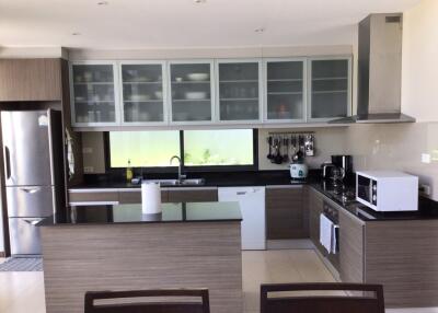 Modern kitchen with stainless steel appliances and island