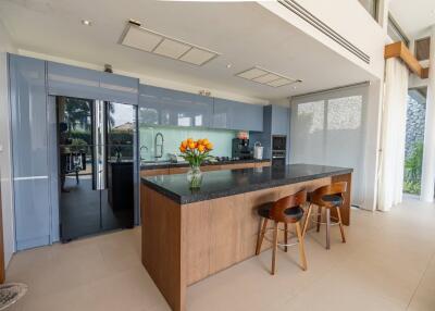 Modern kitchen with island and bar stools