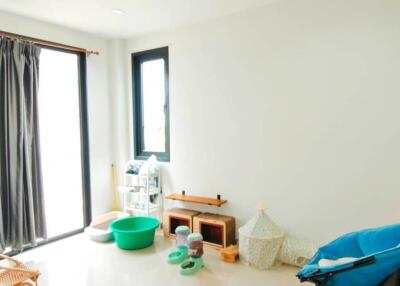 Bright living room with large windows and pet amenities