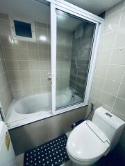 Modern bathroom with bathtub and toilet